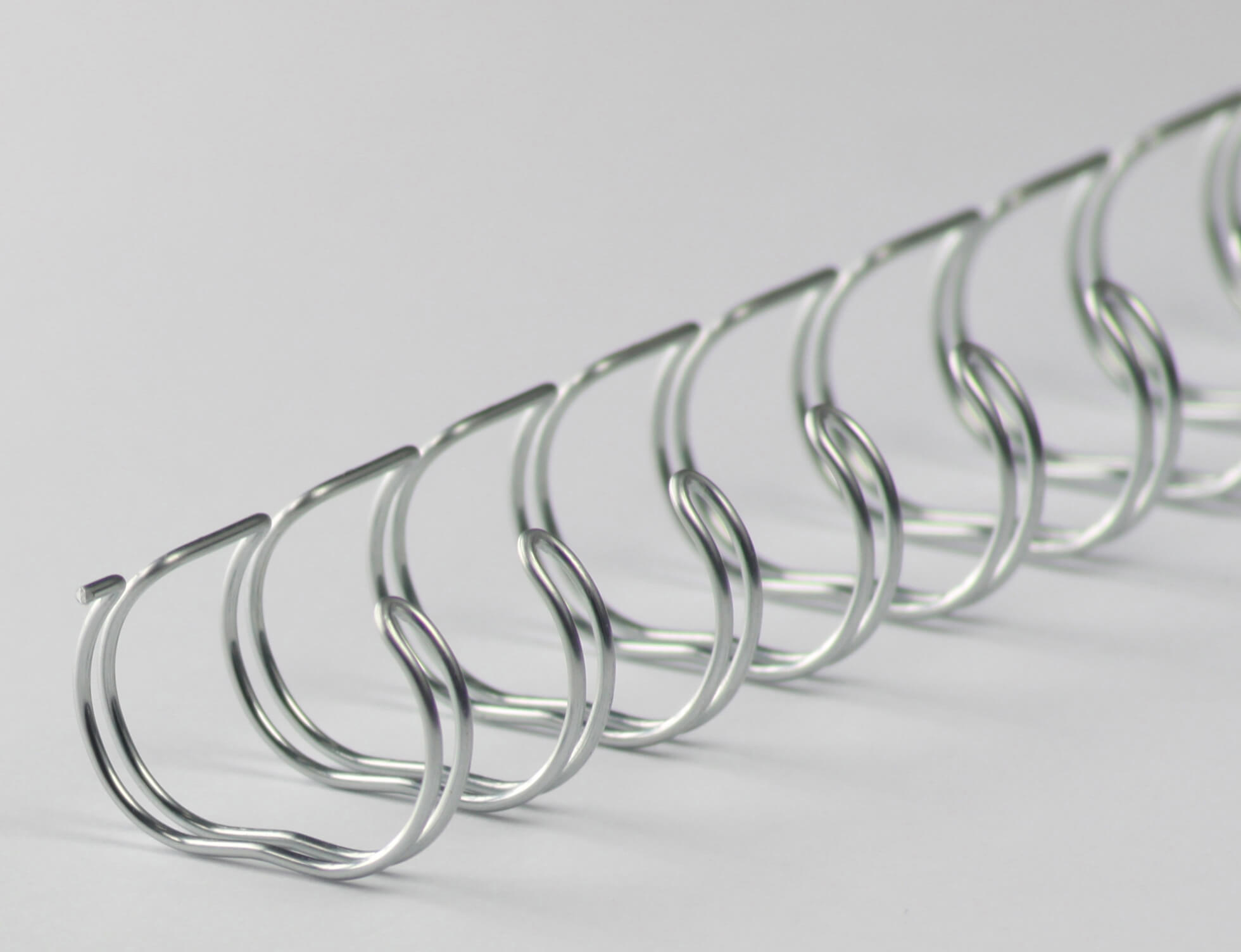 Drahtbinderücken 23 Ringe 14,3mm, 9/16 Zoll, 2:1 in silber | Bestnr. 23RM143-SV